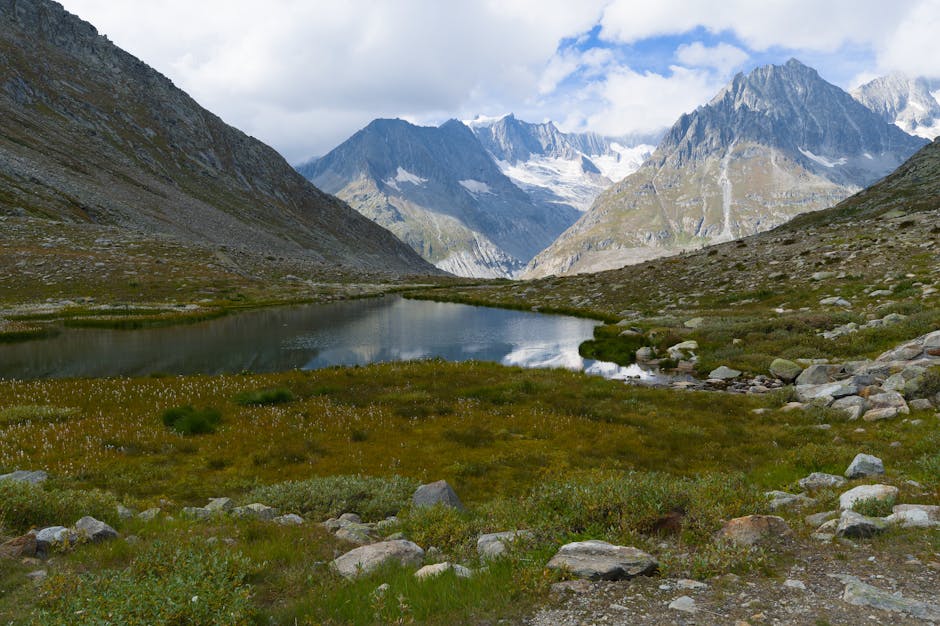 Breathtaking view of alpine mountains and lake in the Swiss Alps.